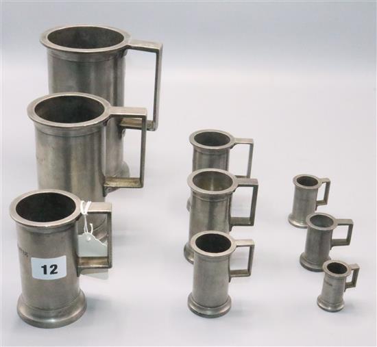 9 graduated pewter measures